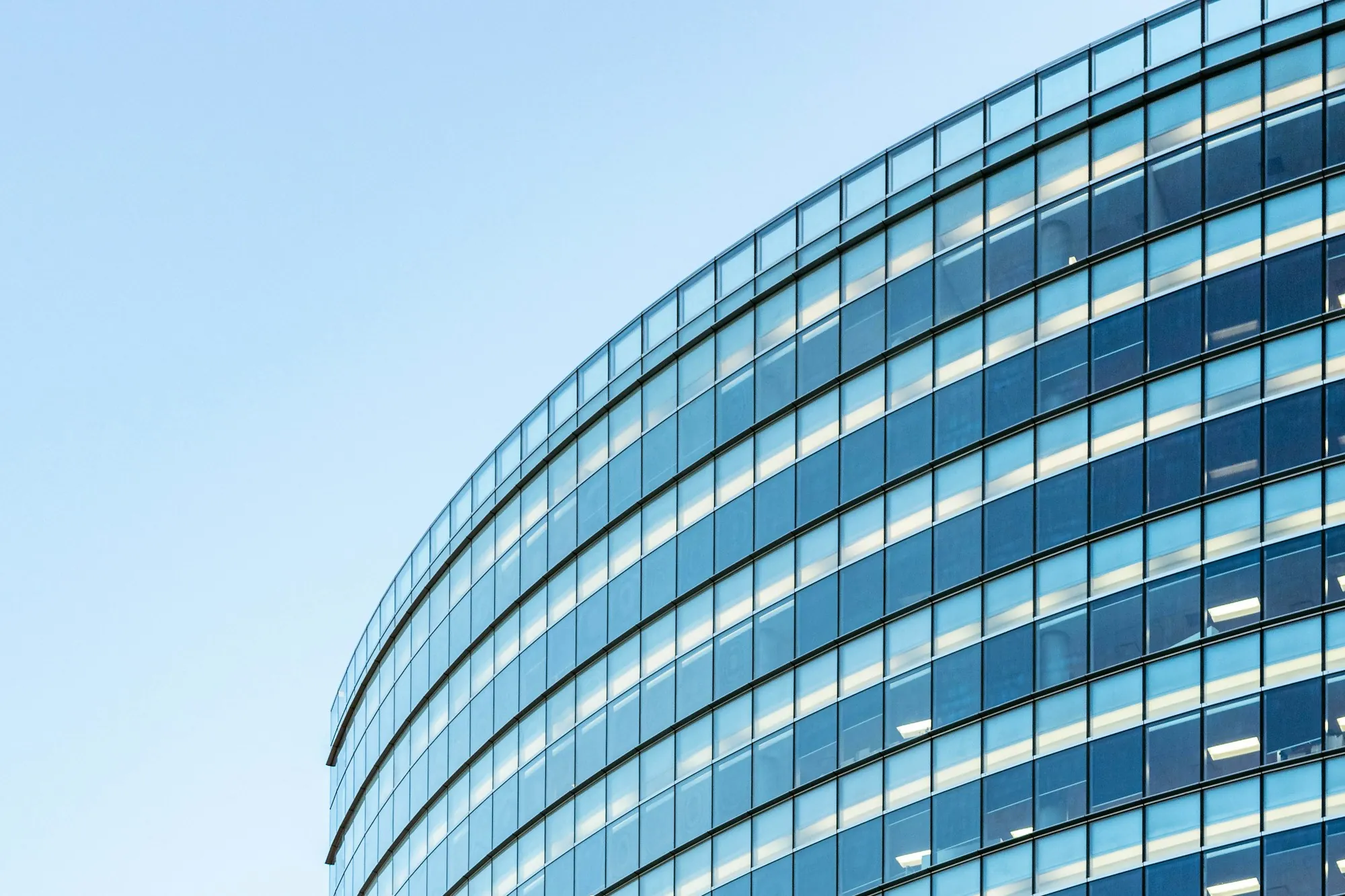 Curved glass office building facade
